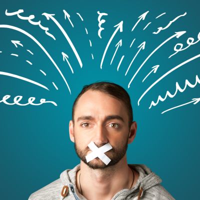 Young man with glued mouth